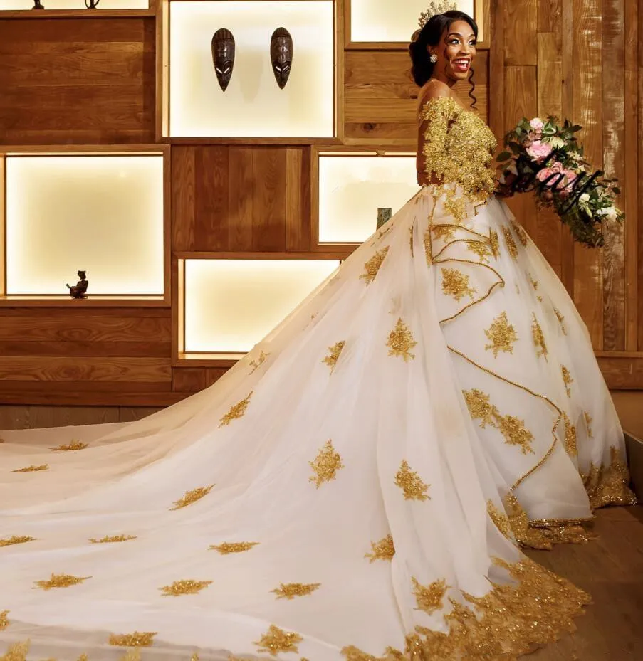 quanto custa um vestido de noiva dourado de luxo