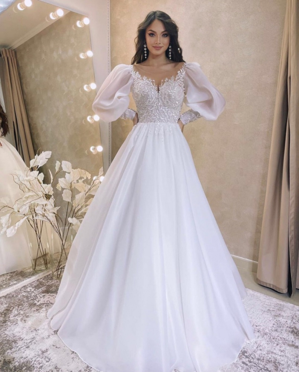 vestido de noiva com mangas bufantes de tule