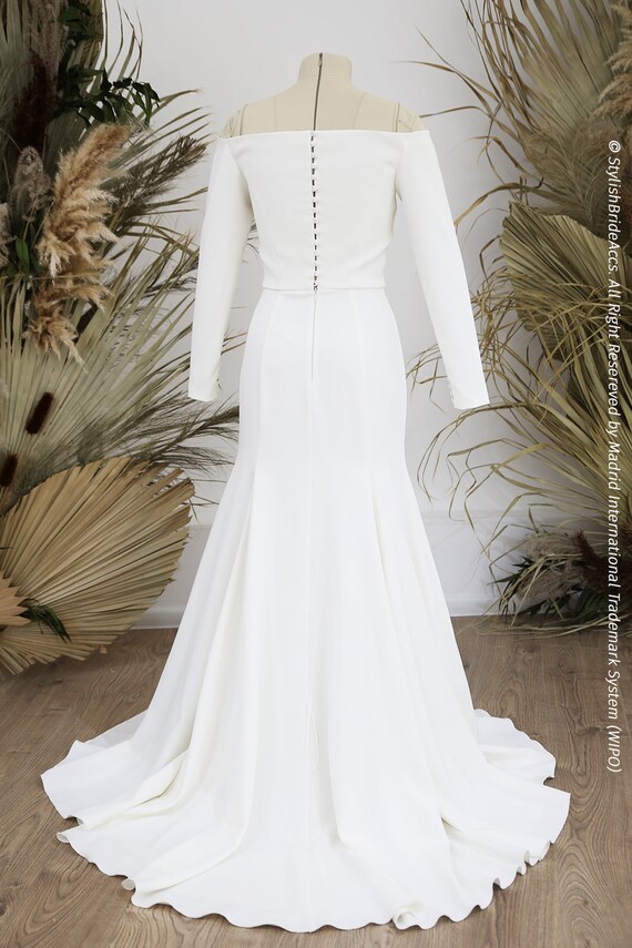 Crepe Alfaiataria vs. Outros Tecidos: Qual o Melhor para Seu Vestido?