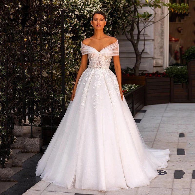 vestido de noiva gola canoa manga longa